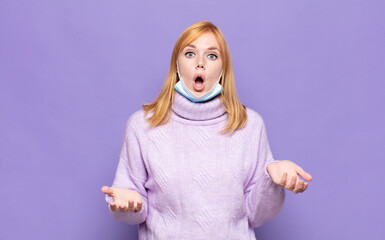 pretty woman  open-mouthed and amazed, shocked and astonished with an unbelievable surprise