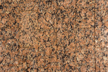 walkway surface paved with granite tiles