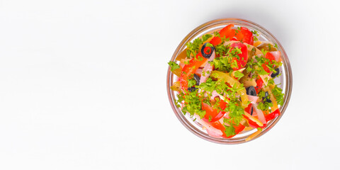 Healthy food - mix vegetable salad served in a bowl over white background. Healthy eating, delicious snack or dinner.