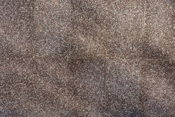 walkway surface paved with granite tiles