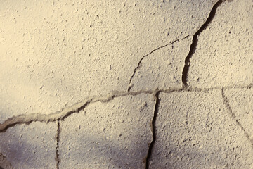 asphalt in cracks texture / abstract background cracks on asphalt road