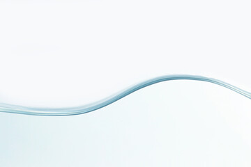 Close up water splash with air bubbles. Fresh and clean surface aqua flowing in wave and clean water on white background isolated. Advertising image with free space for your work