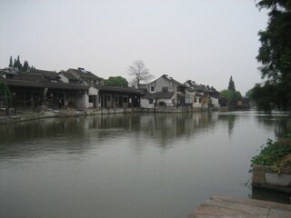 Historical Chinese house at river side