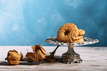 italian canestrelli with fine sugar  over vintage cake stand