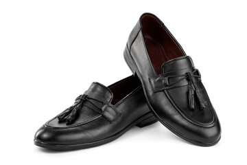 A pair of classic black men's shoes on a white background