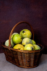 wicker basket with untreated organic quinces