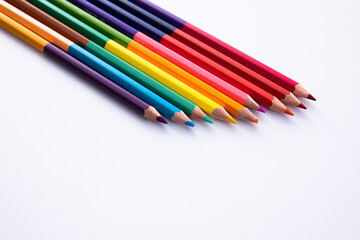 collection of wooden colorful pencils isolated on white background, close view. High quality photo