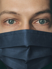 Closeup portrait of a man wearing mask. Quarantine concept
