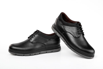 Classic black leather shoes on a white background