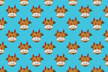 Fototapeta premium ginger cakes in the shape of a bull face. pattern of the cookies