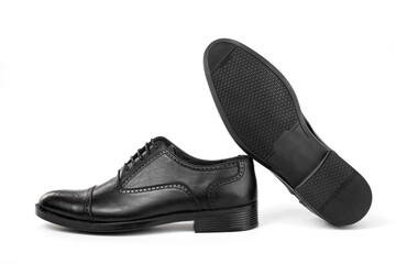 Classic black leather shoes on a white background