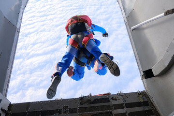 Skydiving. Tandem jump. The start of the jump.