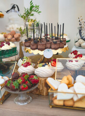 Modern wedding in Poland with sweet table in restaurant party