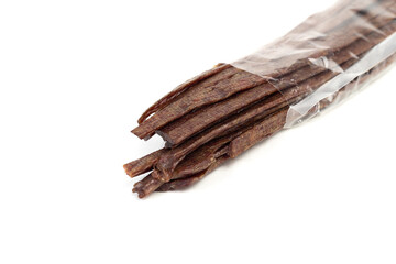 Packaging Dried beef meat sliced on stick, beer snack isolated on white background