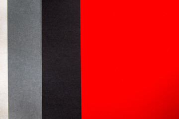 Red, grey, black and white papers background