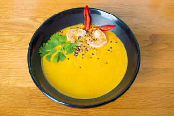 Pumpkin soup for Christmas brunch or dinner. Selective focus