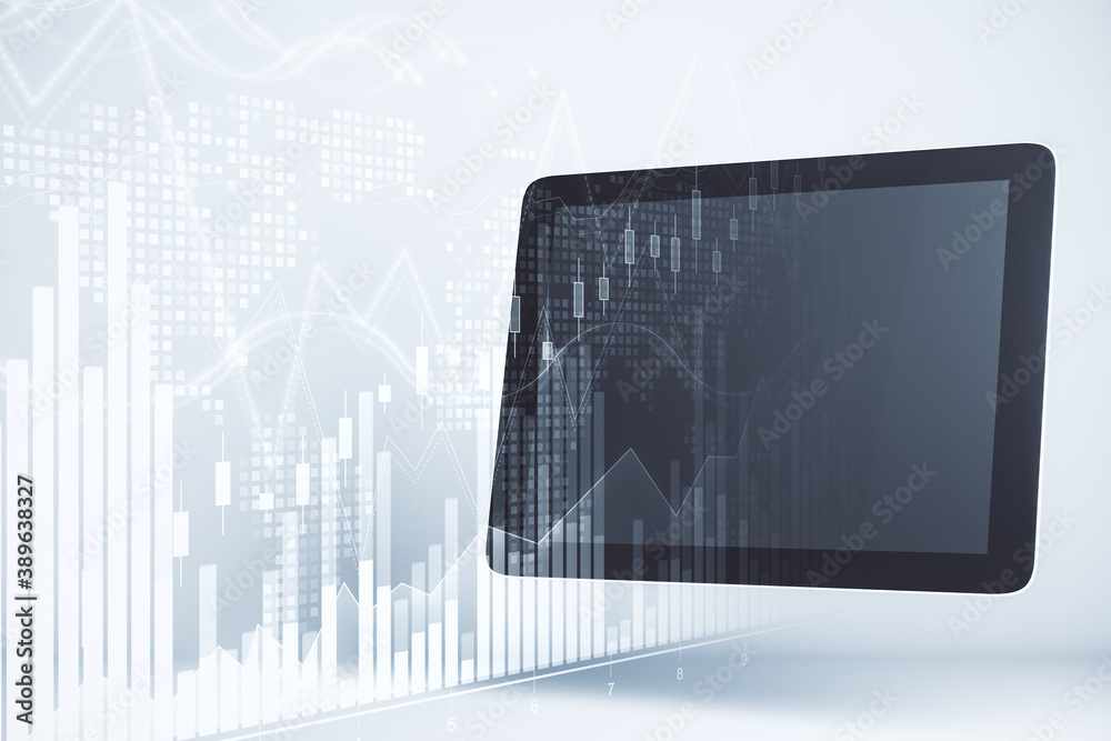 Poster tablet with blank screen and stock charts interface.