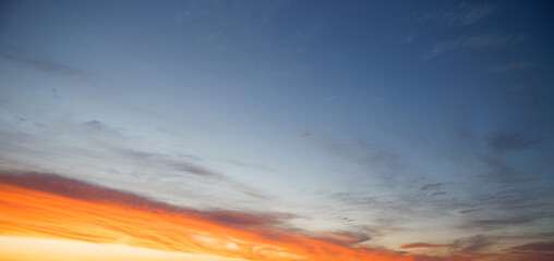 sunset of the red sun on a variegated colored sky