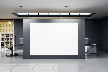 Clean office hall with blank banner on gray wall.