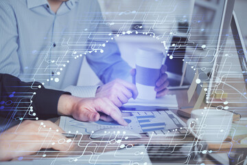 Double exposure of technology hologram with man working on computer background. Concept of big data.