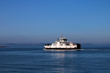 Fototapeta na wymiar Car Ferry Sailing Out of Largs in Scotland