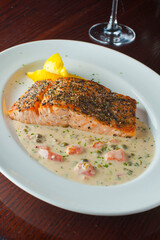Pan roasted Cajun seasoned salmon fillet. Served with rice pilaf, organic steamed vegetables, bell peppers, squash, carrots and zucchini. Classic American diner lunch favorite.