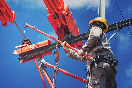 The lineman used tie stick to carve the tie wire used to wrap the electrical wires attached to the damaged high voltage insulator. In order to prepare to replace the damaged equipment