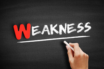 Fototapeta premium Weakness text on blackboard, concept background