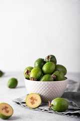 ripe large feijoa in a gray bowl