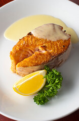 Pan roasted Cajun seasoned salmon fillet. Served with rice pilaf, organic steamed vegetables, bell peppers, squash, carrots and zucchini. Classic American diner lunch favorite.