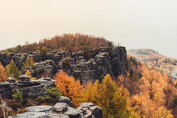 Sandstone Tisa rocks or Tisa walls in Bohemian Switzerland autumn fall dramatic view landscape in Czech-Saxon Switzerland, Czech Republic
