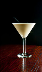 Dessert Cocktail. Alcoholic Drinks made with gin, vodka, rum or whiskey mixed with soda water, fruit juices and garnishes with limes and cherries. Classic American bar drinks.