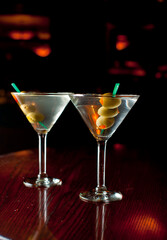 Old Fashioned Cocktail. Traditional American craft cocktails made by artisanal bartenders or mixologists in speakeasy & upscale bars or dive bar taverns. Cocktails served in chilled cocktail glass.