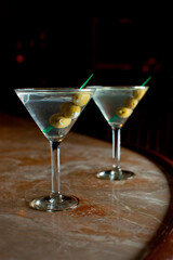 Old Fashioned Cocktail. Traditional American craft cocktails made by artisanal bartenders or mixologists in speakeasy & upscale bars or dive bar taverns. Cocktails served in chilled cocktail glass.