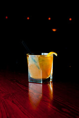 Cocktails. Traditional American drinks made by artisanal bartenders or mixologists in speakeasy & upscale bars or dives or taverns.Cocktails served in chilled cocktail glasses & garnished with fruit.