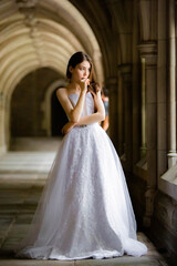 Beautiful girl wearing wedding dress nervous before the ceremony