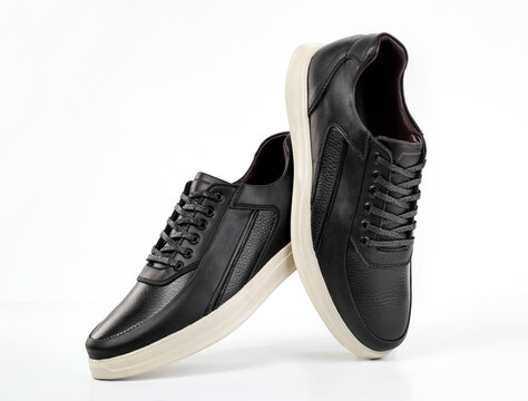 Classic black leather shoes on a white background