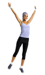 Full body of happy african american or latinos woman jumping or doing fitness aerobics exercise, isolated against white background. Young sporty model with raised up arms, in sportswear, at studio.