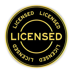 Black and gold color round sticker with word licensed on white background