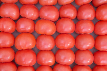 vegetables red ripe tomatoes on the background