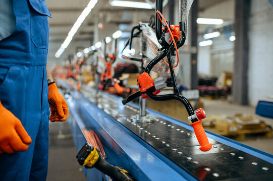 Bicycle Factory, Worker Checks Bike Assembly Line