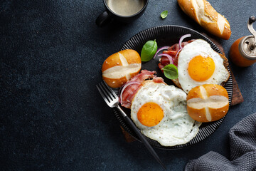 Eggs with bacon served on plate