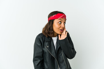 Young latin rocker woman isolated on white background