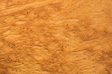 Texture of baked biscuit dough as food background.