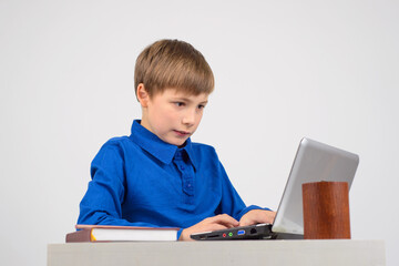 little businessman - Young smart boy carefully, looking intently