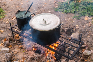 Hiking pot, Bowler in the bonfire, Stock photo