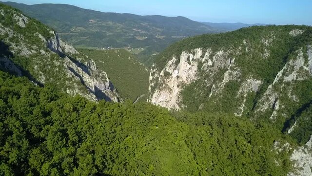 :  Aerial flight over limestone canyon of Vrbas river in Bosnia.