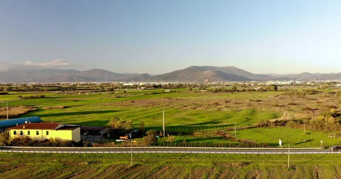 Aerial time lapse of traffic in a contryside landscape. Space for graphic designer or webmaster