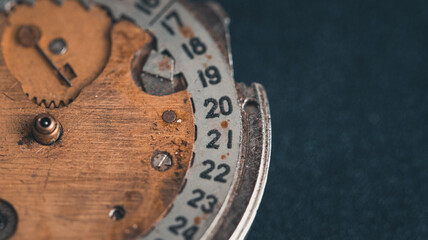 Old clockwork mechanism in close-up. Selective focus on macro details. Light vintage toning. Grunge...