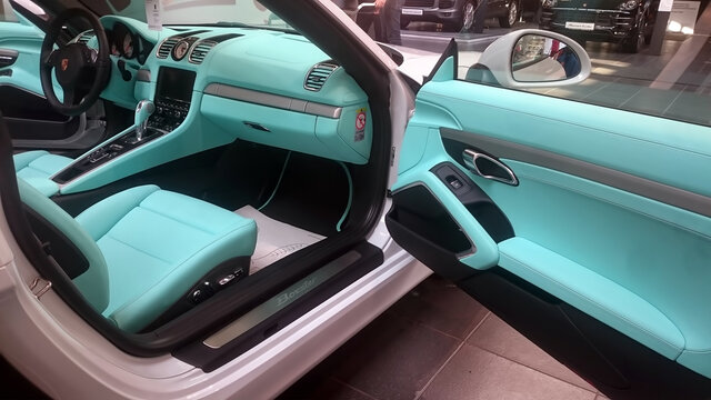 Moscow. Winter 2019. White Porsche Boxter with mint interior in show room. Cabriolet with clocks, pdk, pcm and keyless